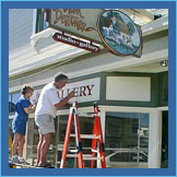 thumbnail of carved sign