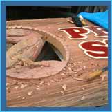 thumbnail of carved sign