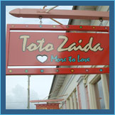 thumbnail of carved sign